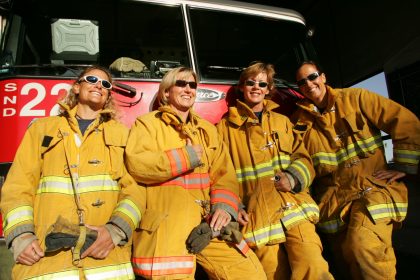 Firefighter Robyn with other firefighter teammates